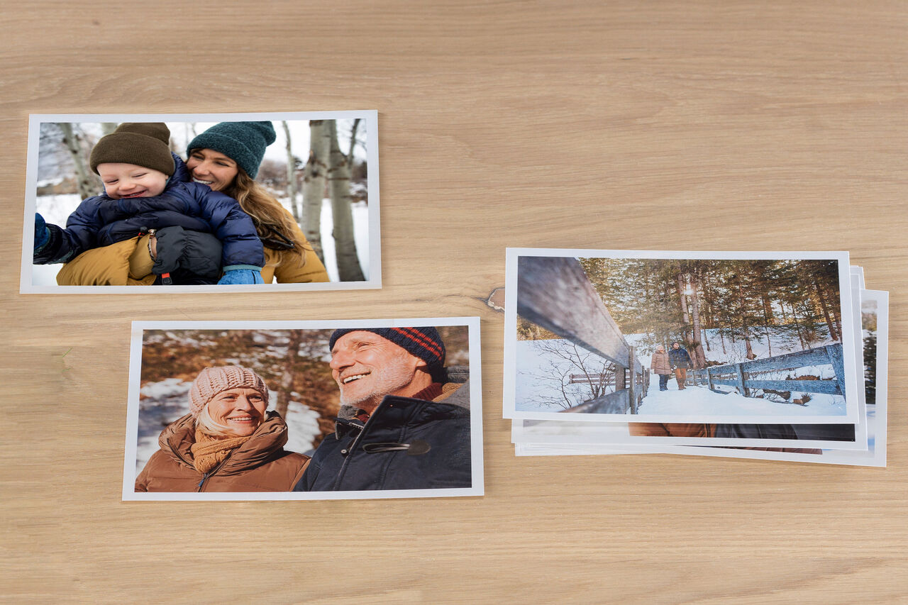 a stack of 10x8" large photo prints, 10x8" prints with a white border