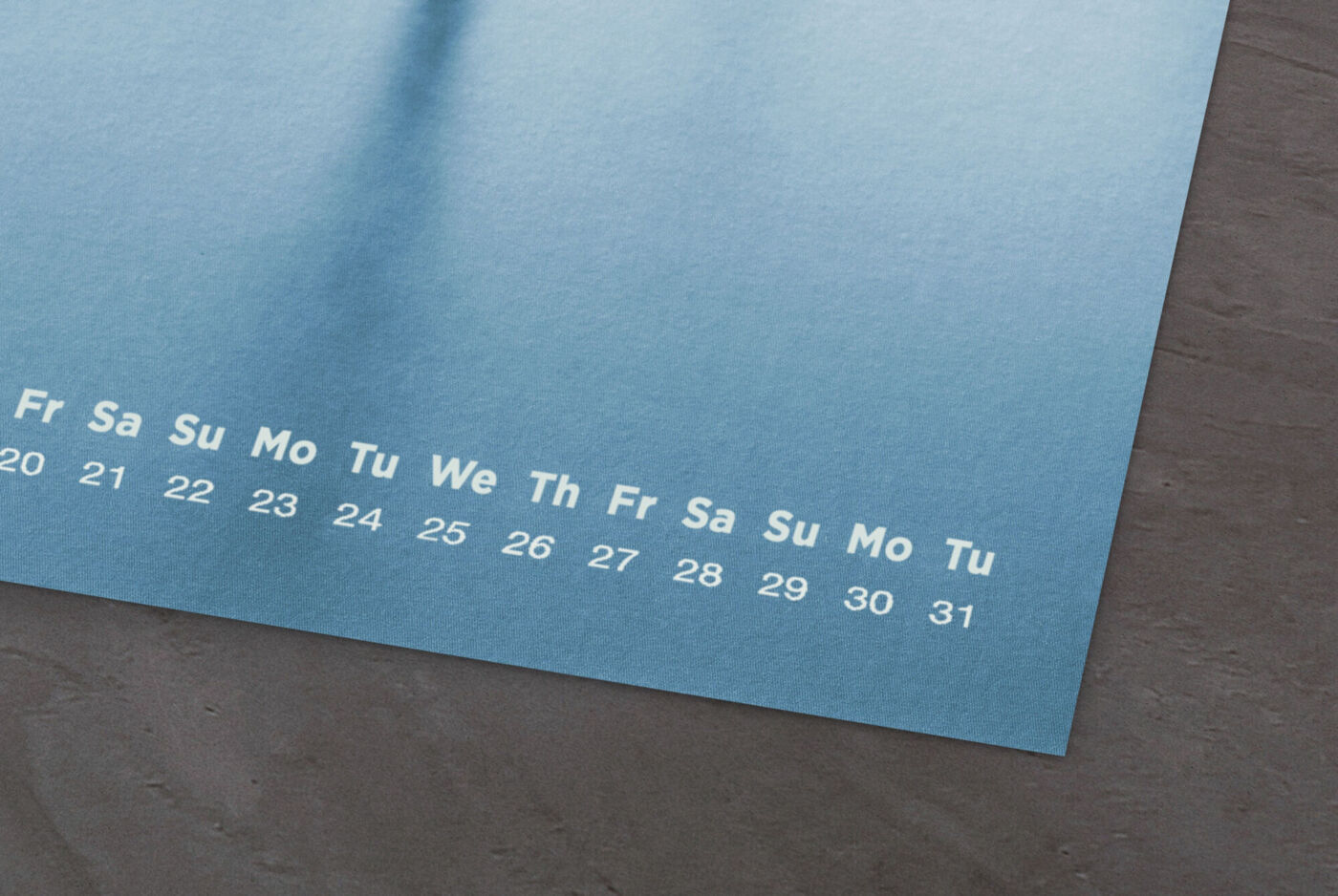 A high-quality calendar with a blue background displaying weekdays and numbers.